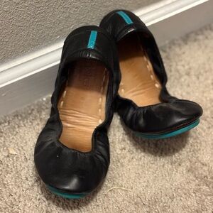 Brown and black tieks.